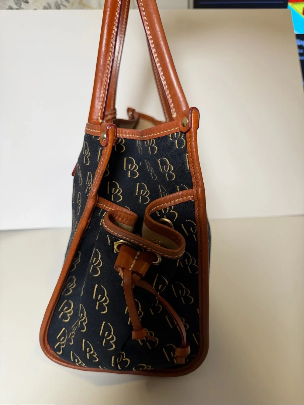 Dooney & Bourke Black Monogram Satchel with Brown Leather Trim